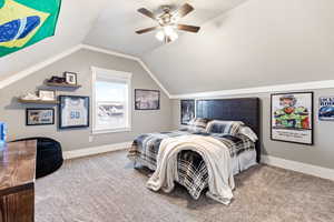 Bedroom featuring light carpet and ceiling fan