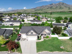 Aerial perspective of suburban area with a mountain backdrop