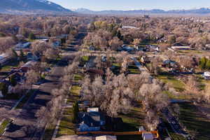 Aerial view of property's location with nearby suburban area