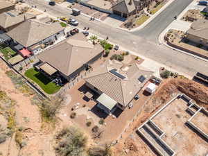 Aerial view of property's location with nearby suburban area