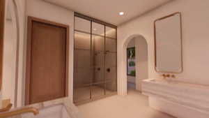 Full bath with vanity, a stall shower, and recessed lighting