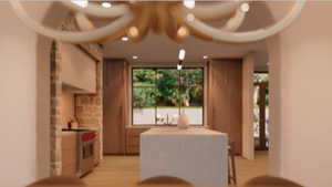 Kitchen with light countertops, stainless steel electric range, a kitchen breakfast bar, and light wood finished floors