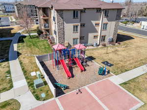 Communal playground featuring a yard