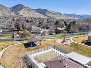 Aerial view of residential area featuring a mountain backdrop