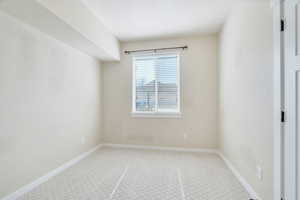 Spare room with light carpet