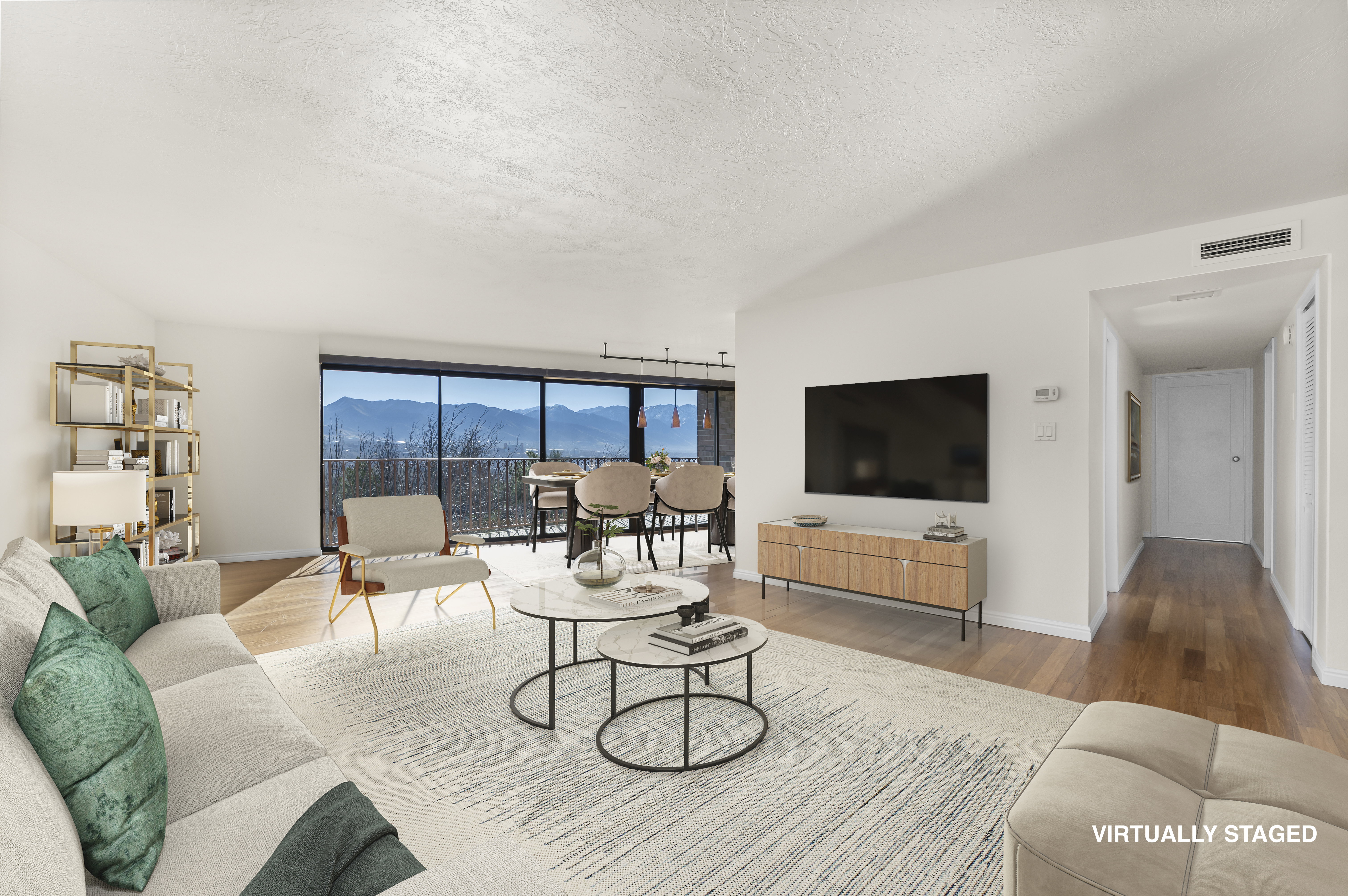 Living room featuring wood finished floors and a textured ceiling