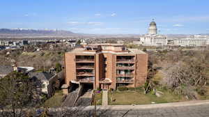 View of property with a mountain view