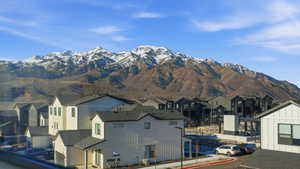 Mountain view and a view of the Clubhouse from the west side window of the townhome for sale.