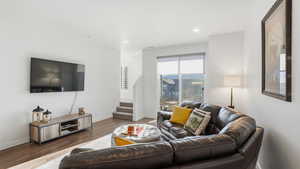 Living room featuring wood finished floors and recessed lighting