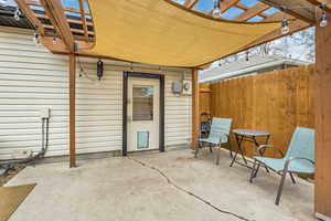 View of patio with a pergola