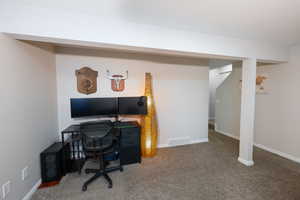 Office featuring carpet and baseboards