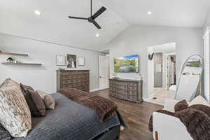 Bedroom with dark wood-style flooring, a ceiling fan, recessed lighting, and ensuite bath