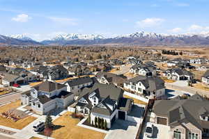 Aerial view of residential area with a mountainous background