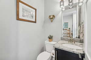 Bathroom featuring toilet and vanity