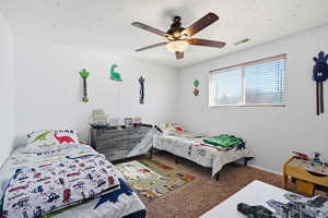 Bedroom with carpet floors and ceiling fan