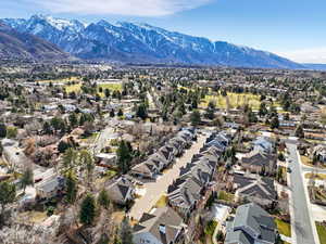 Aerial view of residential area featuring a mountain backdrop