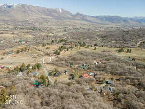 View of mountain background featuring rural landscape