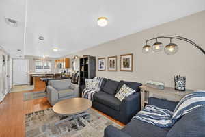 Living area with light wood-style flooring