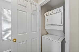 Laundry area with stacked washer / drying machine