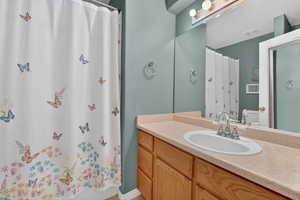Bathroom with vanity and toilet