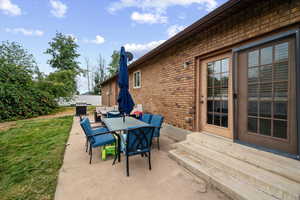 View of patio / terrace with outdoor dining space and area for grilling