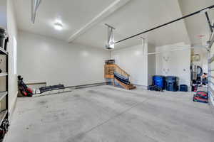 Garage featuring baseboards