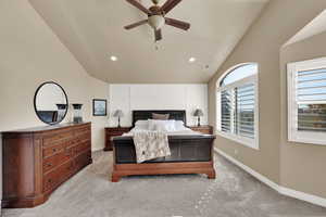 Bedroom featuring light carpet, ceiling fan, recessed lighting, and lofted ceiling