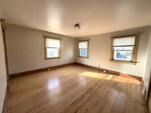 Master Bedroom featuring baseboards and hardwood / wood-style floors
