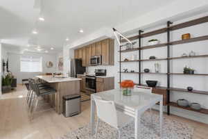 Light filled dining area with easy access to the covered patio and mountain views.