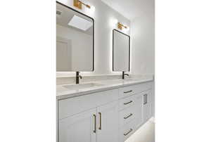 Full bathroom with double vanity