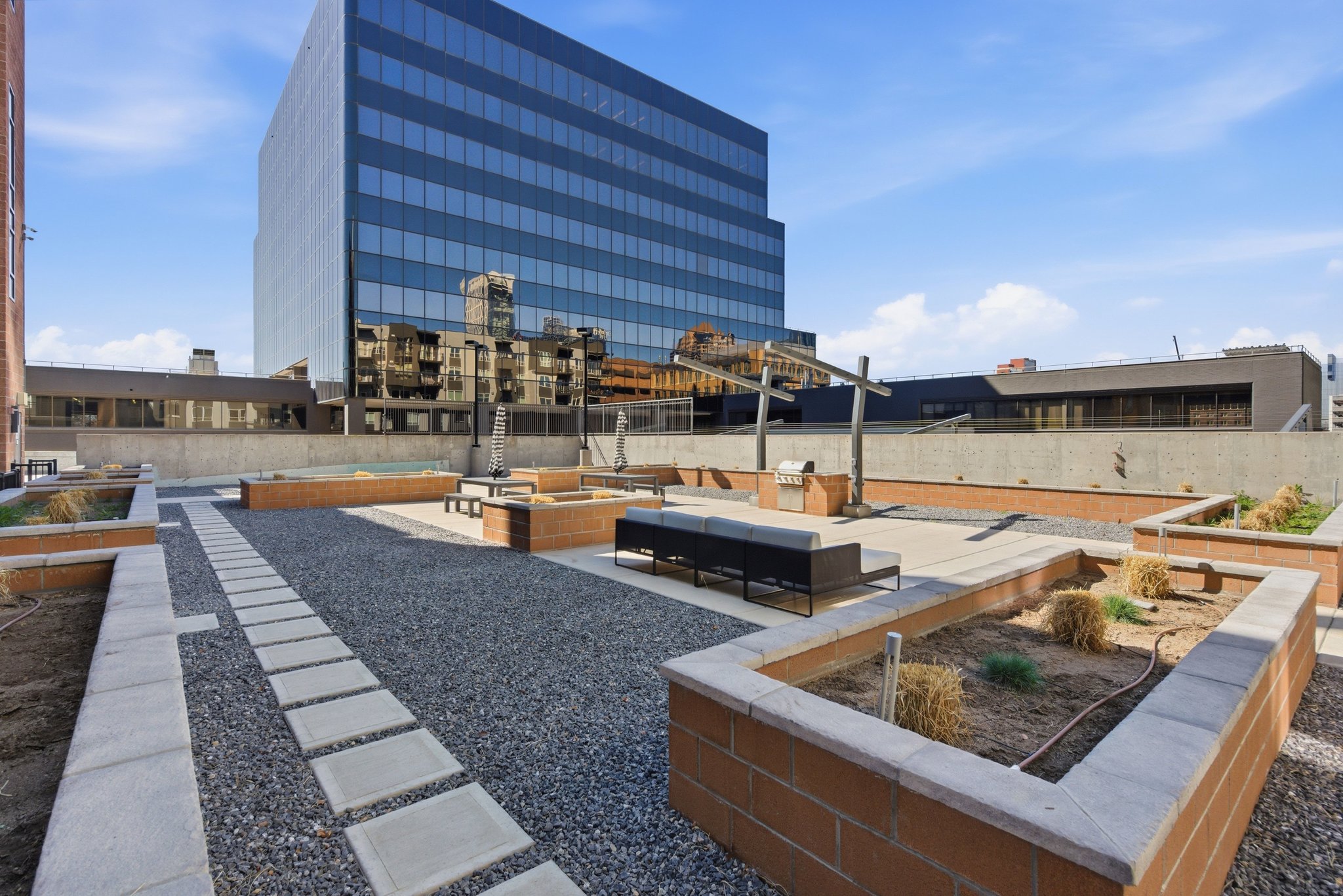 View of yard featuring a garden and a patio area