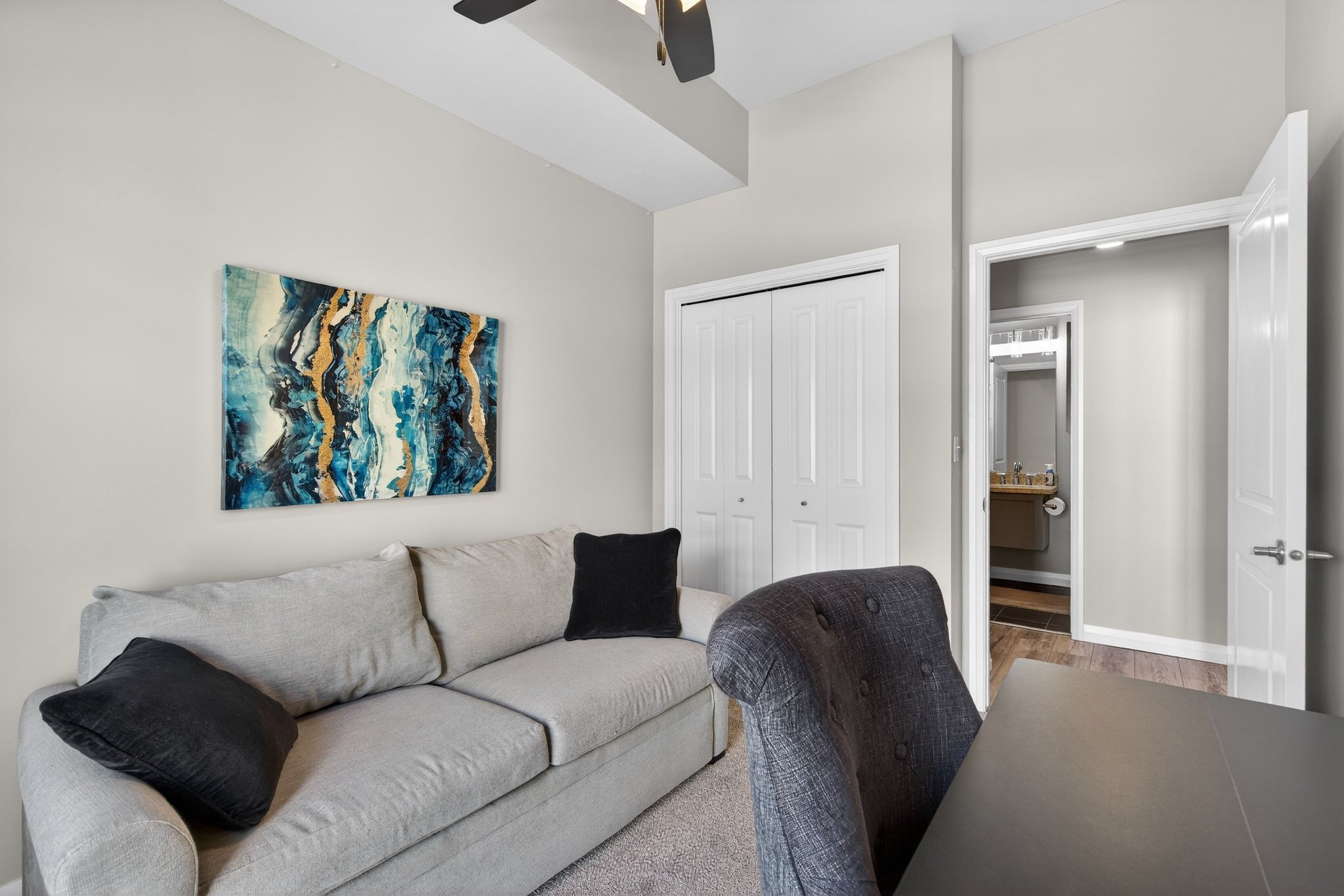 Office featuring ceiling fan and wood finished floors