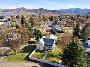 Aerial perspective of suburban area featuring mountains