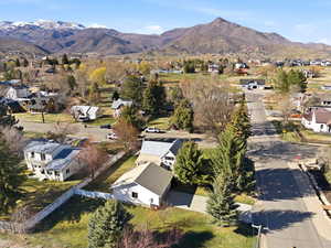 Aerial view of residential area featuring mountains