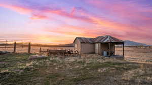 View of outbuilding featuring a mountain view
