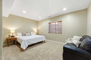 Bedroom featuring carpet floors and recessed lighting