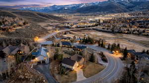 Aerial view at dusk of a mountain view and a residential view