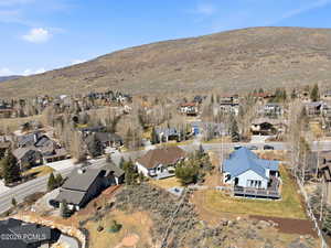 Aerial view of residential area with a mountain backdrop