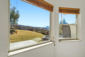 Doorway to outside with a mountain view