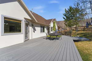 Wooden deck with outdoor dining area
