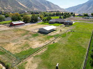 Aerial view of sparsely populated area featuring a mountainous background