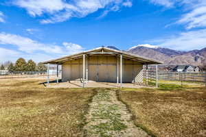 View of outdoor structure featuring an exterior structure and a mountain view