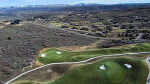 Bird's eye view of a local golf course and a mountain backdrop
