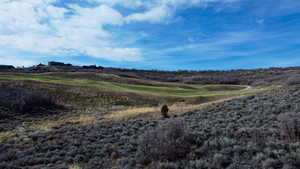 Mountain view featuring a local golf course