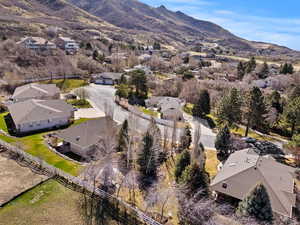 Aerial view of residential area featuring a mountain backdrop