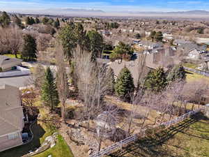 Aerial view of residential area featuring a mountain backdrop