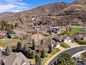 Aerial perspective of suburban area featuring mountains
