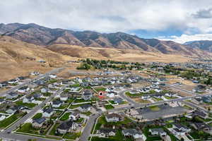 Aerial perspective of suburban area with mountains