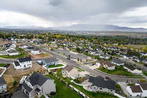 Aerial view of residential area with a mountain backdrop