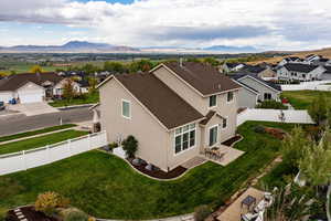Aerial view of residential area with a mountain backdrop